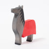 Wooden toy horse from Ostheimer with red blanket | © Conscious Craft